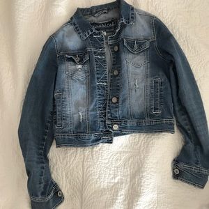 Distressed denim jacket